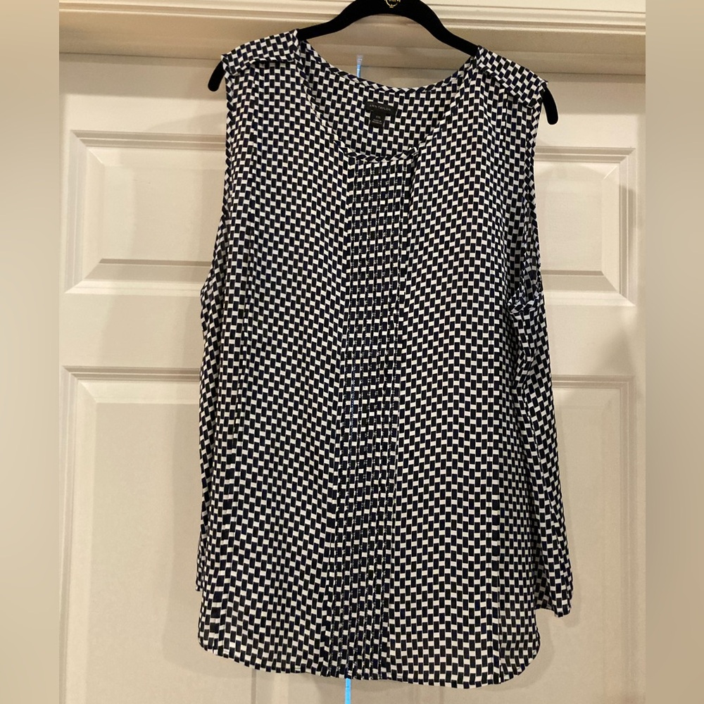 And Taylor pull over shell in Navy and white and pleaded front sleeveless